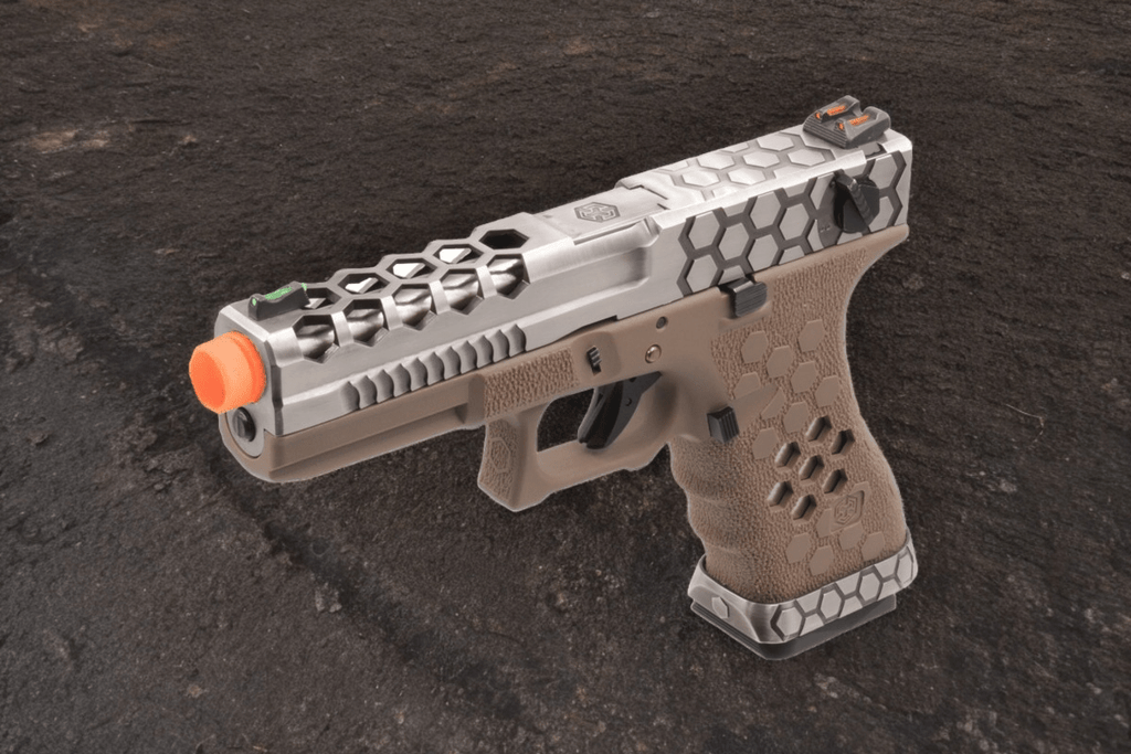 Armourer Works VX0210 G18C Fully Automatic GBB Pistol in hex cut design with orange tip, ideal for competitions and skirmishes.