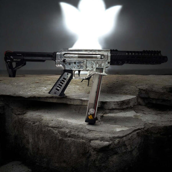 Armoury Upgraded Chimera DSG ARP9 Machine Pistol with custom laser engraving on a stone surface.