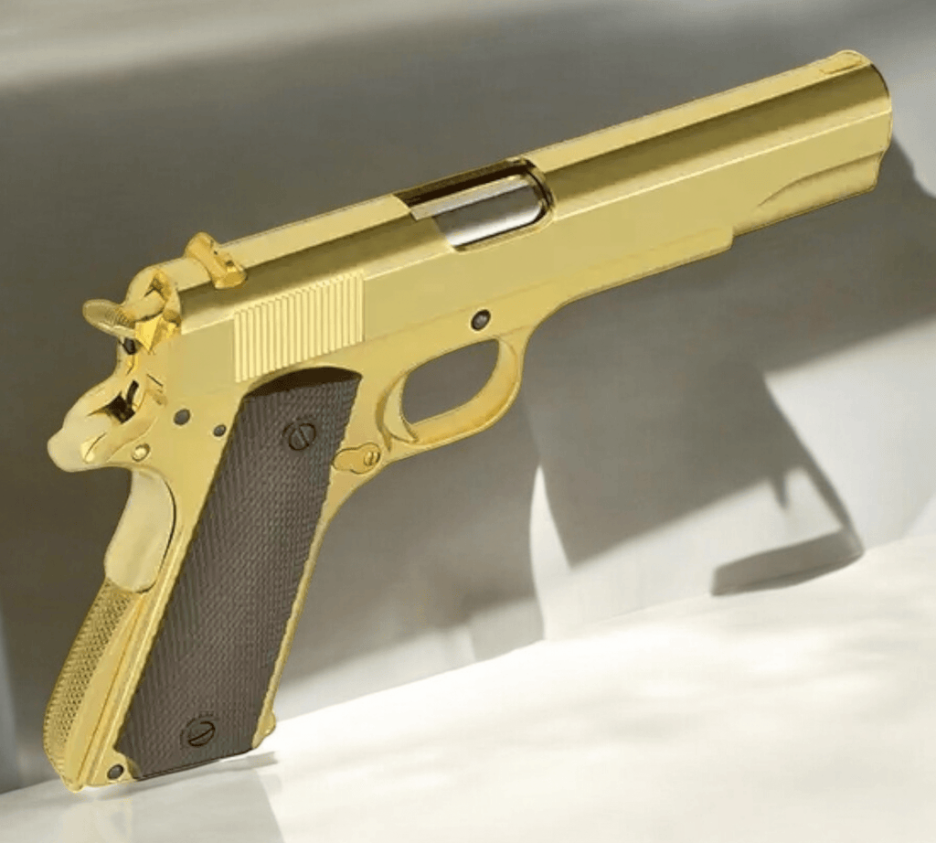 Golden Eagle 3305G Classic 1911 gold gas pistol on display, showcasing polished gold finish and authentic design.