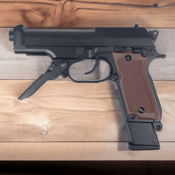 KELe Beretta 93R gel blaster pistol in black with brown grip on wooden surface.